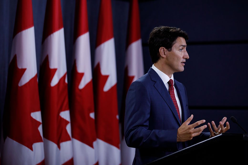 Justin Trudeau at podium. PMO Photo by Adam Scotti