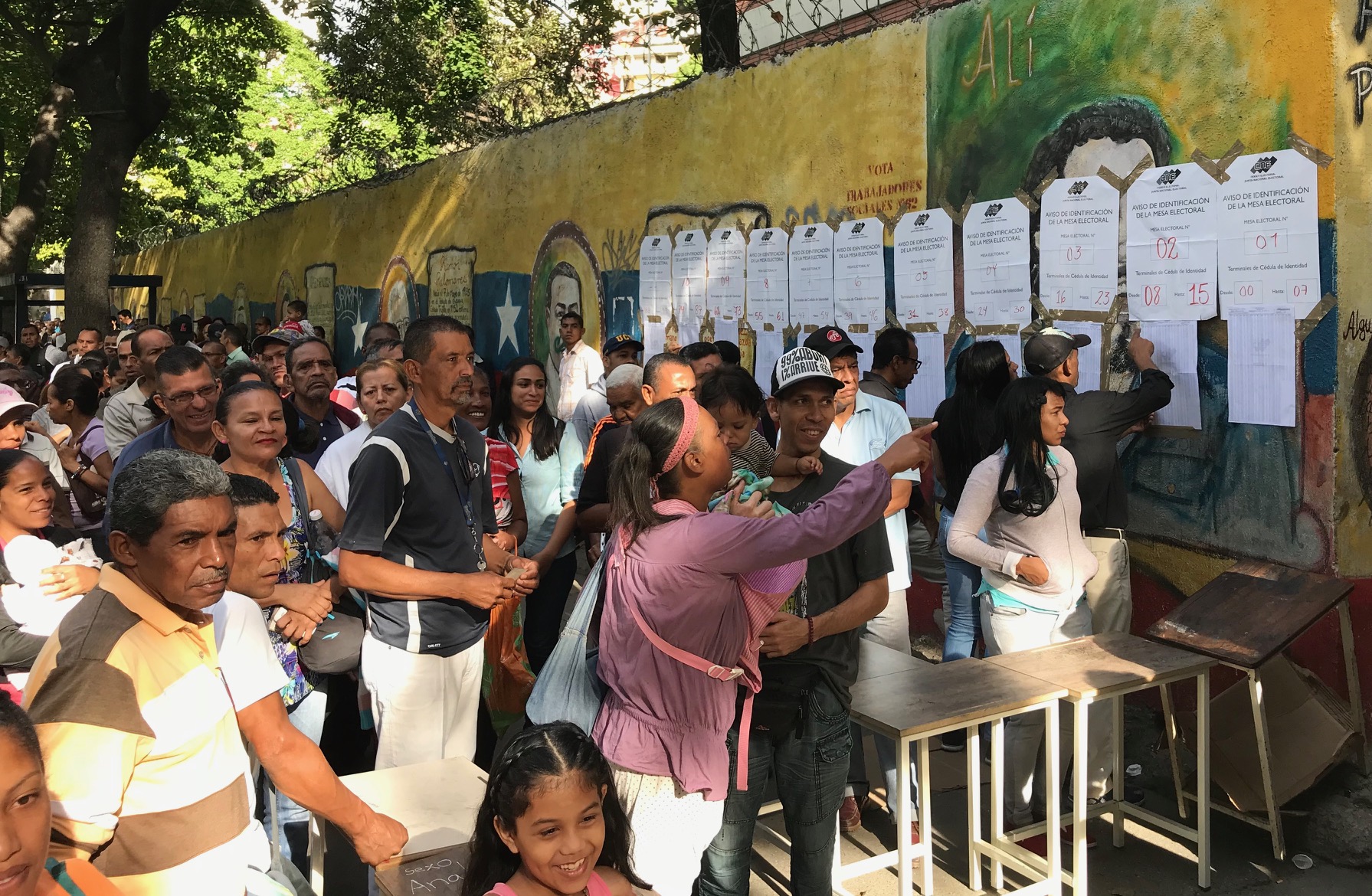 checking voters lists in El Valle neighbourhood, Caracas