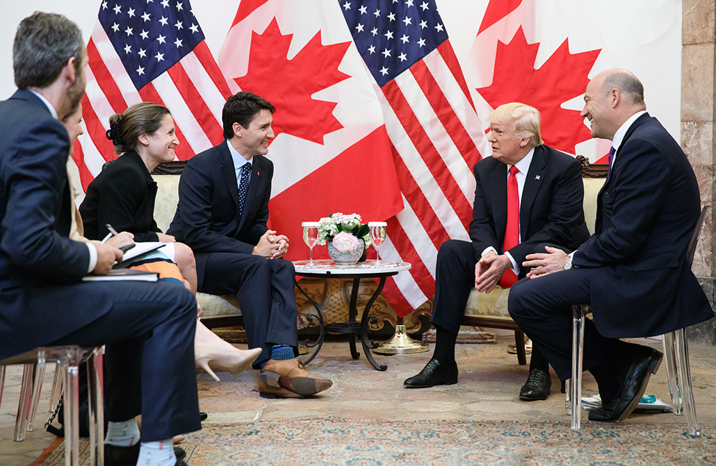 Prime Minister Justin Trudeau speaks with Donald Trump during the G7 in Taormina, Italy.Photo: Adam Scotti/PMO