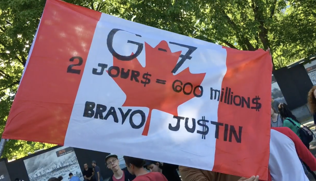 Protest sign at Charlevoix G7 meeting. Photo: Humberto DaSilva