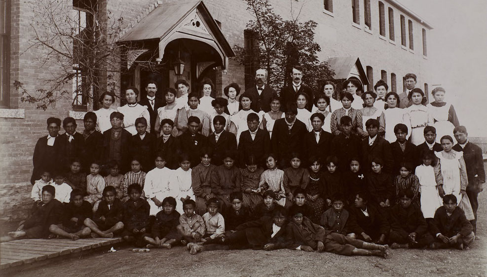 Residential School students and staff, Regina, Saskatchewan, 1908. Photo: John Woodruff/BiblioArchives / LibraryArchives/Flickr