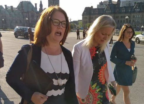 Liberal cabinet ministers Jane Philpott and Catherine McKenna arrive for the cabinet meeting that approved their government’s purchase of the Trans Mountain pipeline. Photo by Brent Patterson.