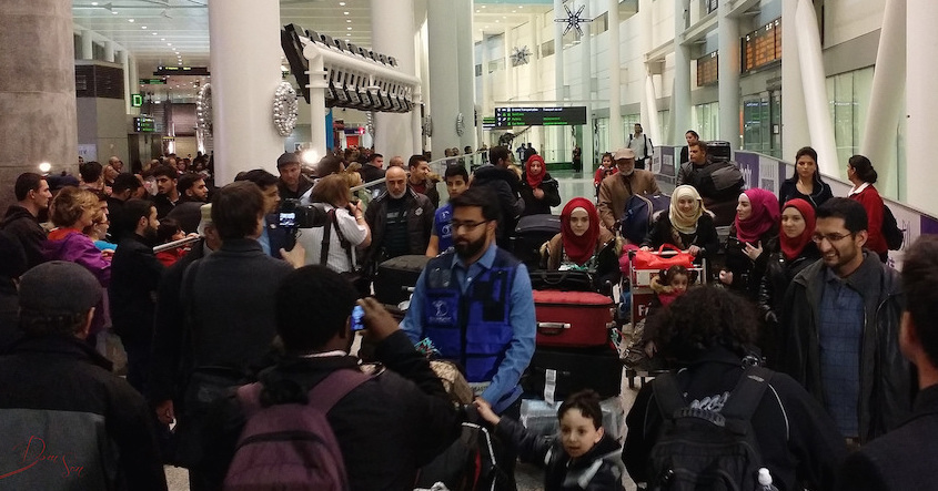 Syrian families arrive in Toronto Pearson airport in 2015. Photo: Domnic Santiago/Flickr