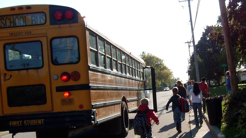 Children boarding school bus. Photo: SouthernWI/Flickr