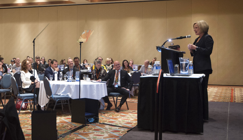 Alberta Premier Rachel Notley addresses Alberta Teachers Association social studies teachers yesterday as environmentalist Tzeporah Berman looks on.