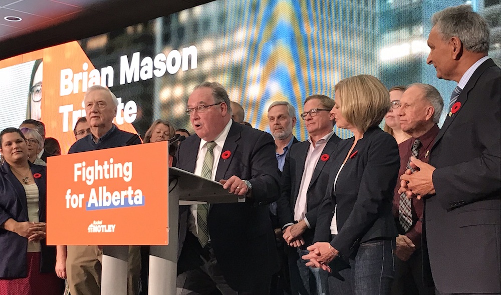 Former Alberta NDP leader Brian Mason says farewell to the party’s convention in Edmonton yesterday as the premier, former leaders and MLAs look on