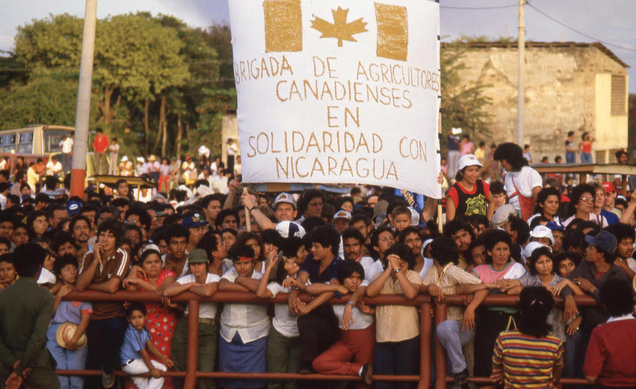 Members of the first Canadian Farmers Brigade to Nicaragua attend the January 1985 inauguration of Daniel Ortega as FSLN President. Photo credit: Lois Ross