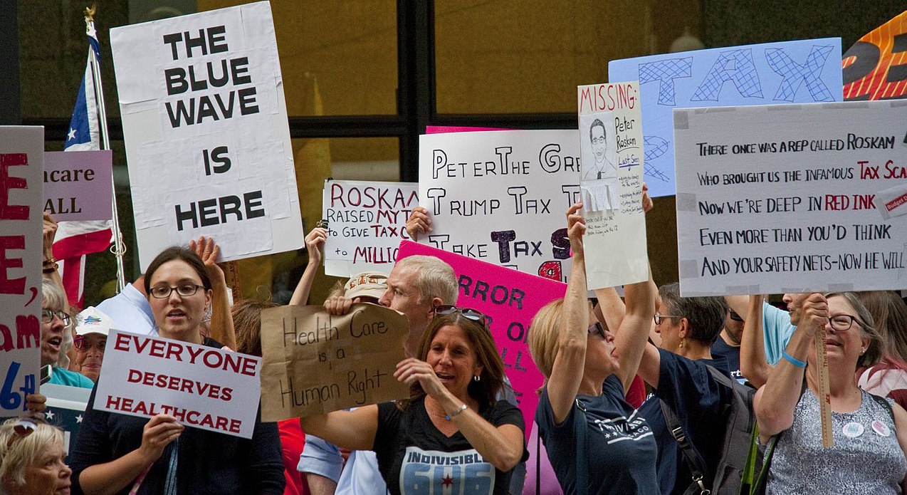 Protesting Illinois 6th District Republican Congressman Peter Roskam in Chicago. Photo: Charles Edward Miller/Wikimedia Commons