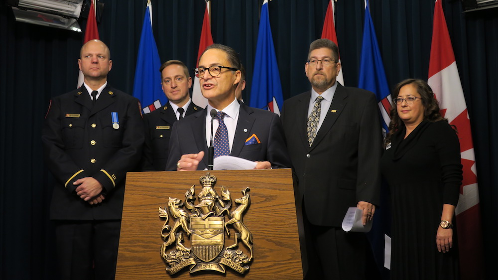 Finance Minister Joe Ceci, flanked by public service pension members, discussed Bill 27 at a press conference Tuesday (Photo: David J. Climenhaga).