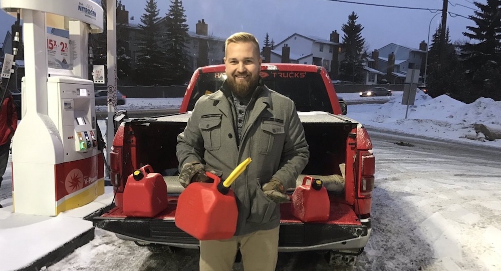Freedom Conservative Party Leader Derek Fildebrandt, back in his UCP days, filling up extra gas cans to avoid the carbon tax. The next day gas prices went down (Photo: Twitter).