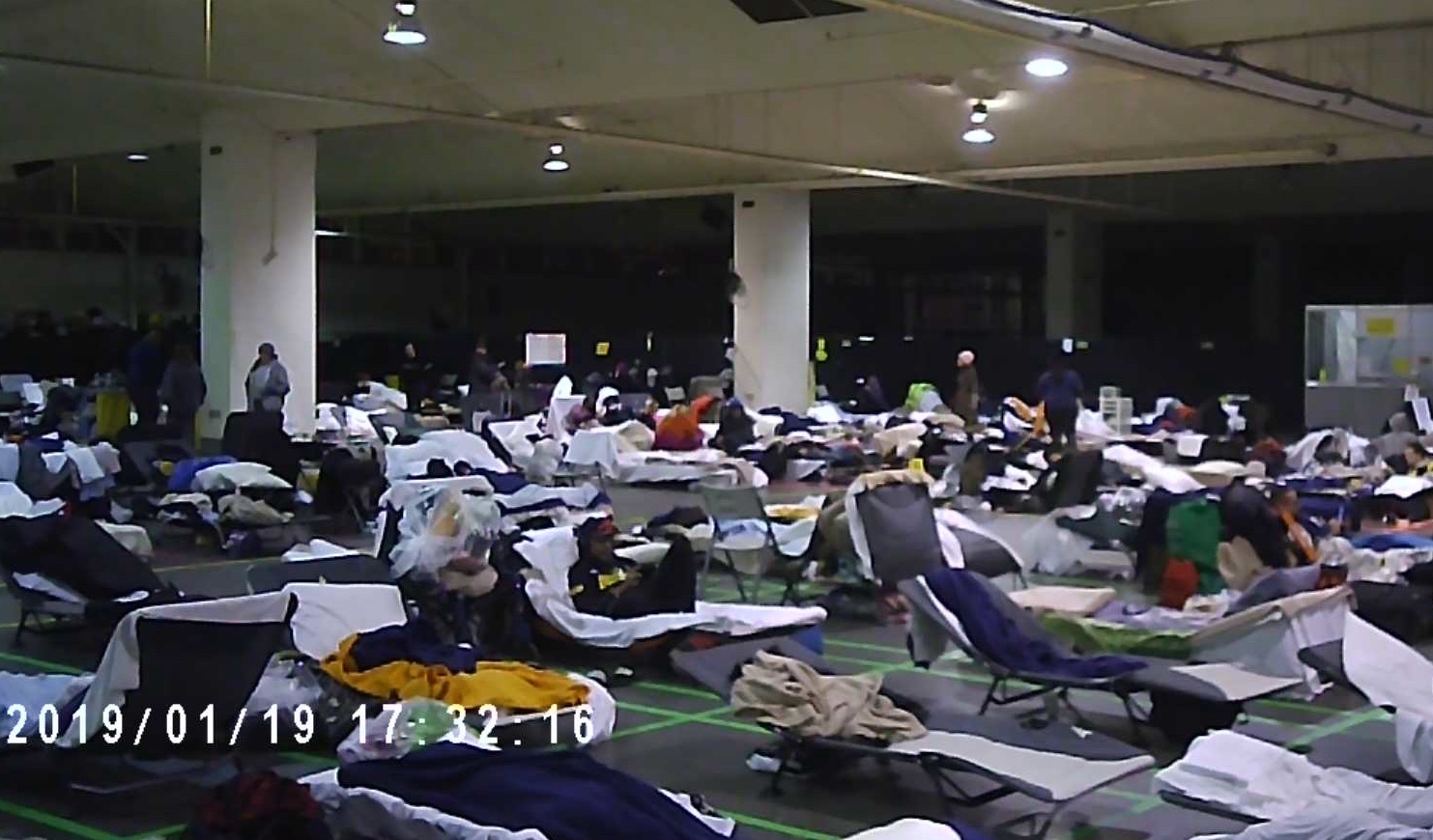 Crowded conditions in one of the second-tier shelters in Toronto shows rows and rows of cots where 200 people sleep. Photo courtesy of Cathy Crowe.