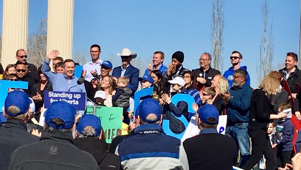 UCP Leader Jason Kenney, apparently wearing one of Stephen Harper’s old unthreatening sweaters, at Spruce Meadows south of Calgary yesterday.