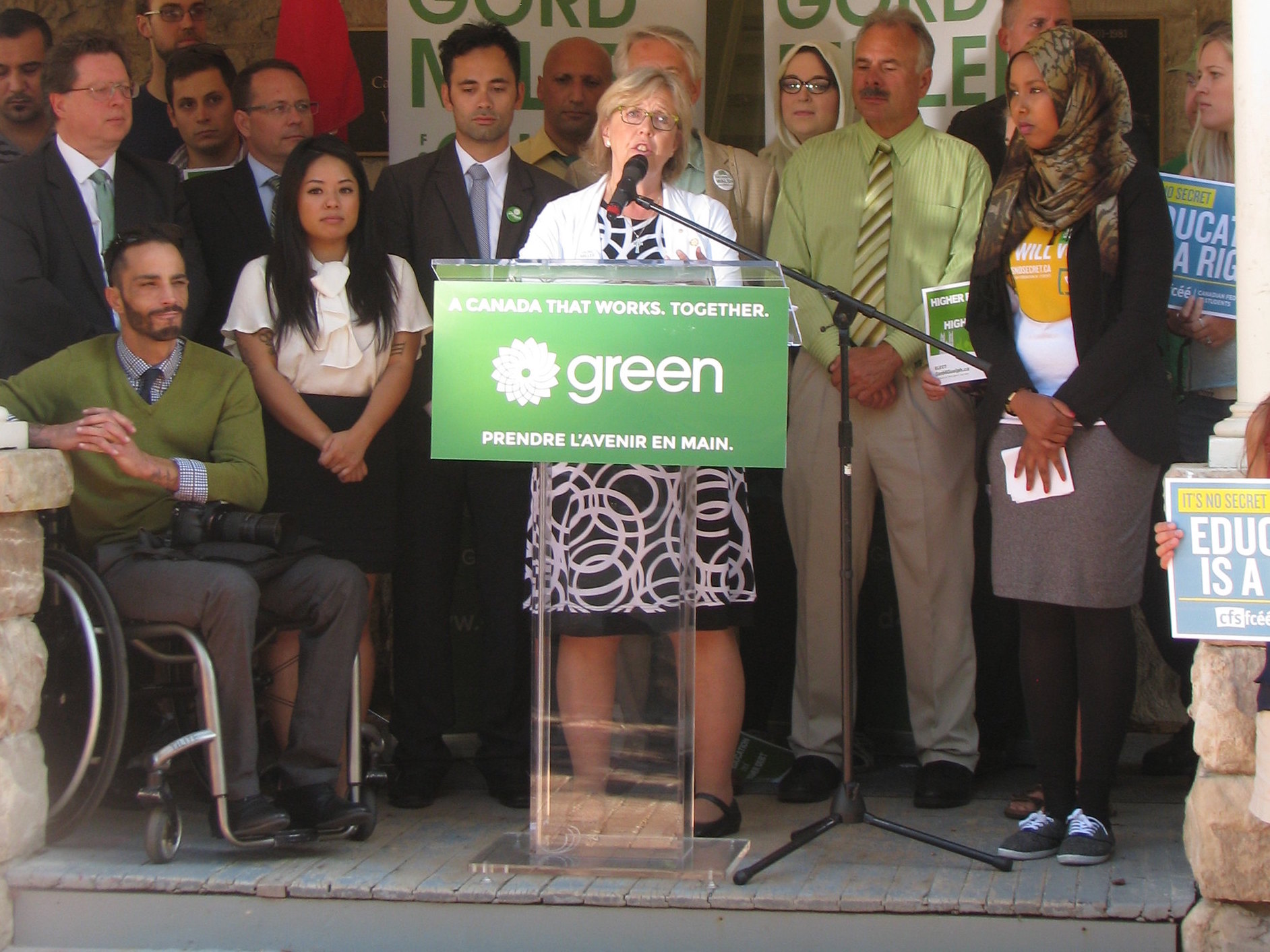 Elizabeth May at podium in 2015. Photo: Bob Jonkman/Flickr