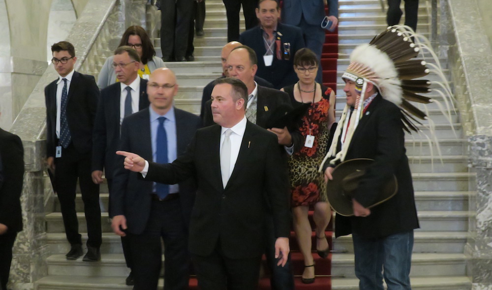 Alberta Premier Jason Kenney, channeling Ralph Klein, arrives in the legislative building's rotunda after the throne speech. Photo: David J. Climenhaga