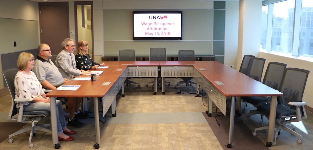 The amusing staged photo of part of UNA's bargaining team that accompanied the union's news release yesterday. Photo: United Nurses of Alberta.