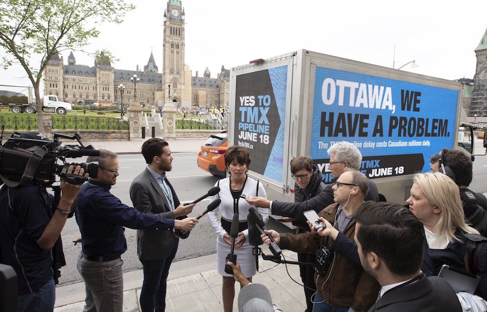 Alberta Energy Minister Sonya Savage talks to reporters at the foot of Parliament Hill. Photo: Sonya Savage/Twitter