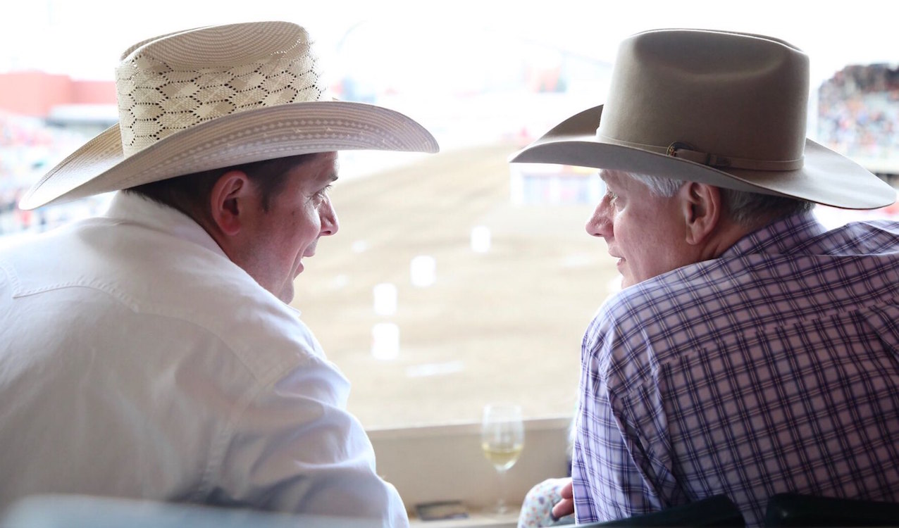 Andrew Scheer speaks with Stephen Harper at 2018 Calgary Stampede. Photo: Andrew Scheer/Flickr