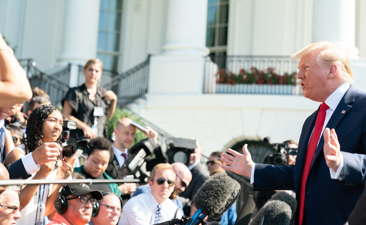 U.S. President Donald Trump answers reporter’s questions outside the South Portico entrance of the White House Friday, July 12, 2019. Photo: The White House/Flickr