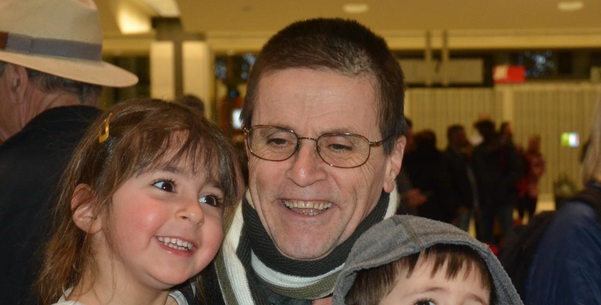 Hassan Diab with his family at Ottawa airport on his return to Canada after his detention in France.