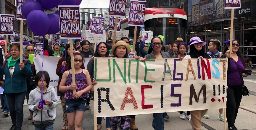 Farm workers, care workers, migrant rights groups and anti-racism activists marched in June to call attention to the plight of Canada's temporary foreign workers. Photo: Marites Sison