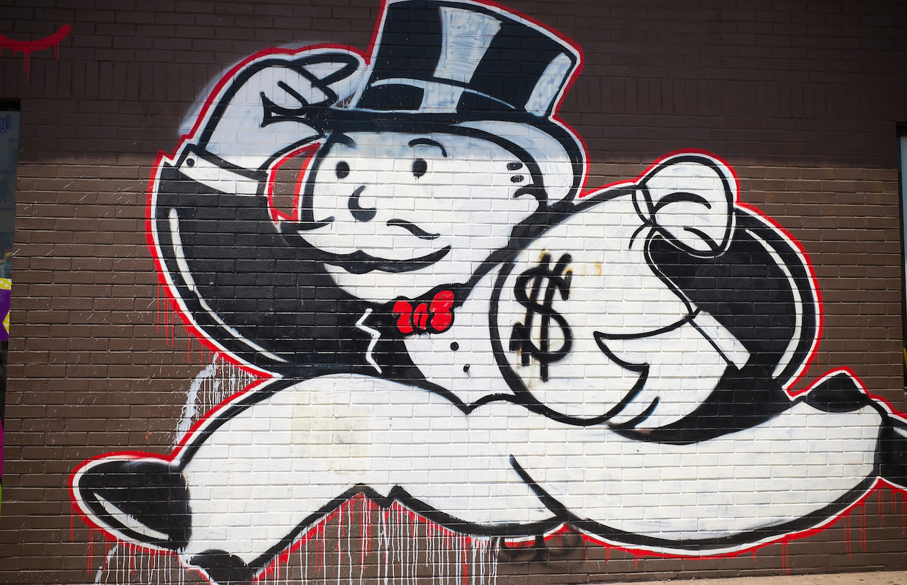 Graffiti art depicting millionaire character from Monopoly game. Image: Sean Davis/Flickr