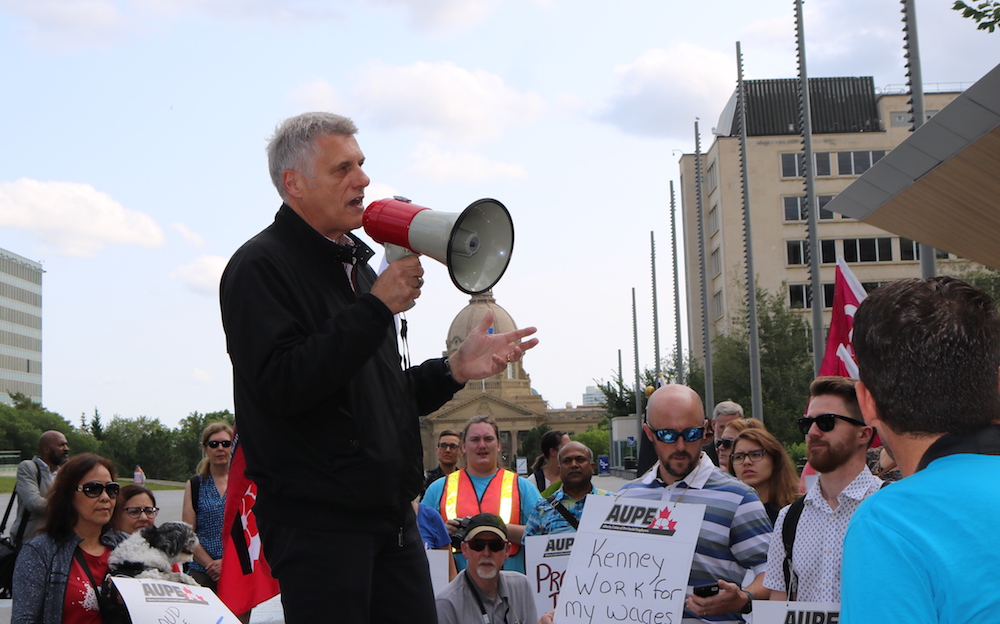 AUPE President Guy Smith addresses union members and supporters Wednesday in Edmonton (Photo: David J. Climenhaga).