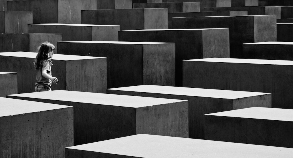 Child visits Holocaust Memorial in Berlin. Image: Lisa Leonardelli/Flickr