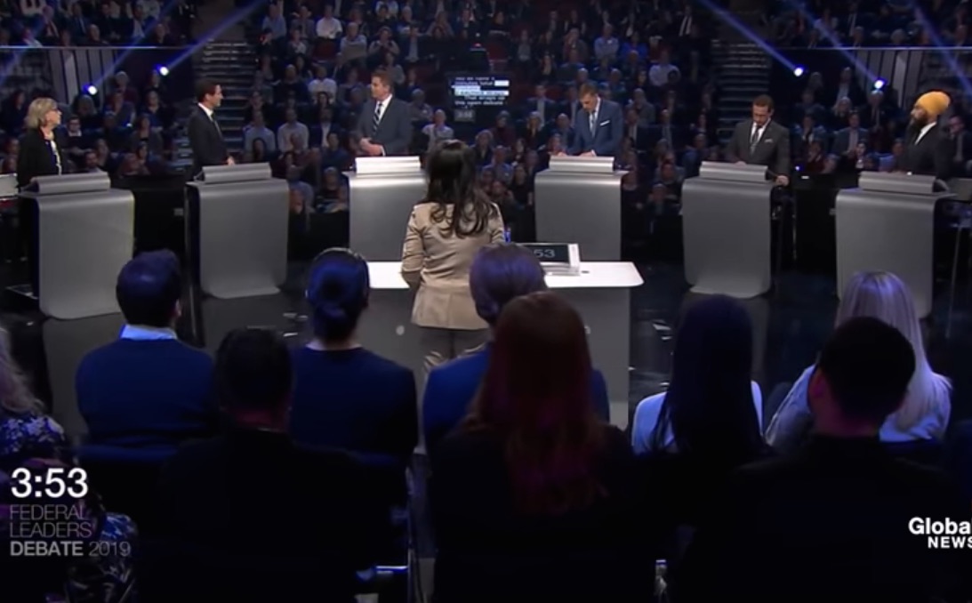 Still from debate livestream. Image: YouTube