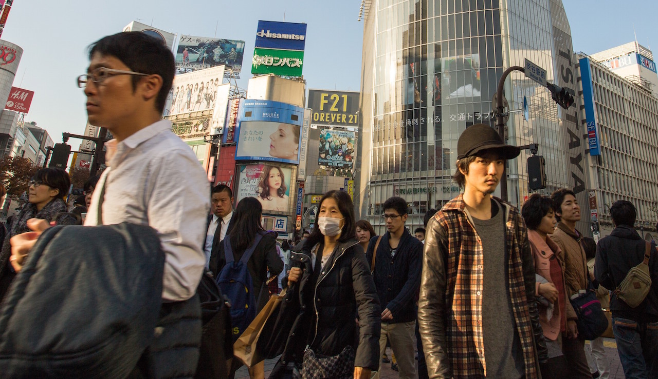 People on the streets of Tokyo. Image: Jason Ortego/Unsplash