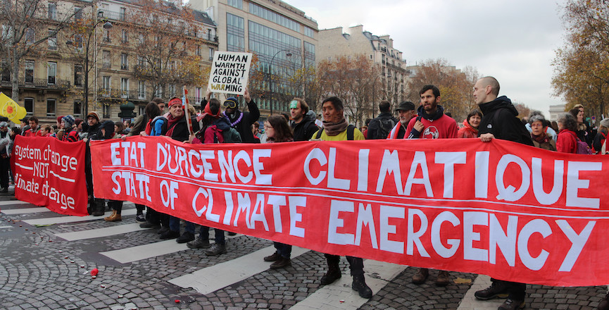 Protesters at COP21 in Paris. Image: John Englart/Flickr