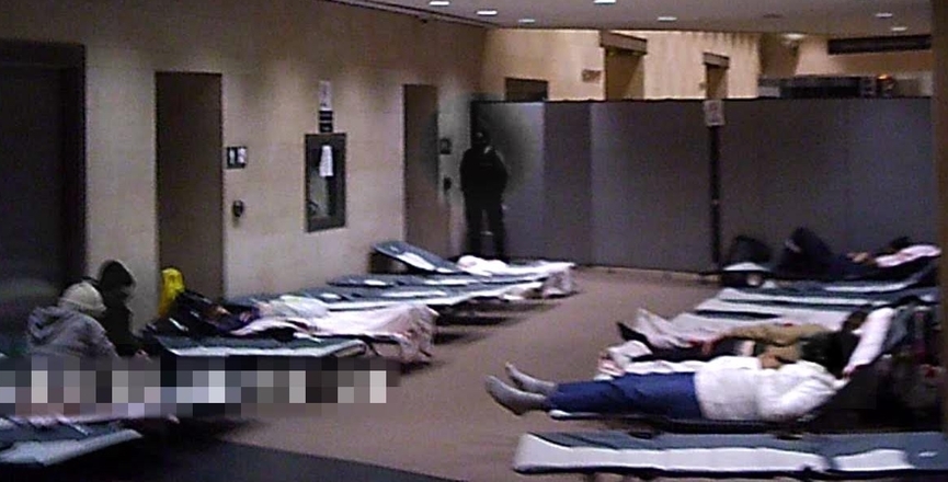 Crowded cots in the hallway warming centre at Metro Hall. Image: Contributed/Cathy Crowe.