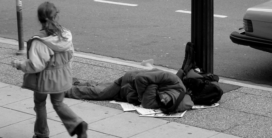 Man sleeping on Canadian sidewalk. Image: The Blackbird/Wikimedia