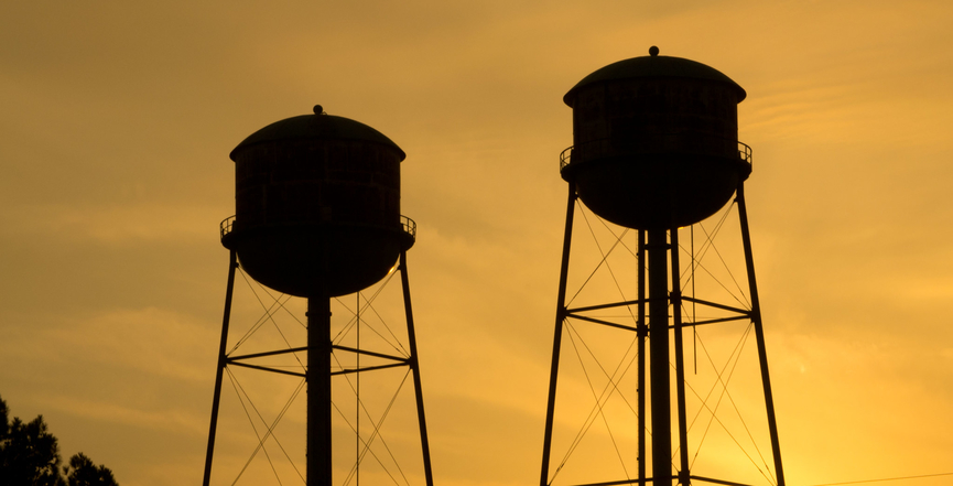 Water towers at sunset. Image: Chris Diroll/Flickr