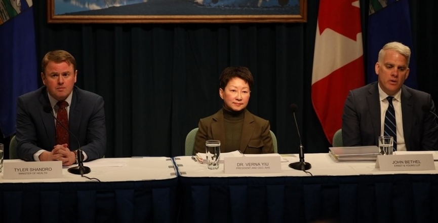 Health Minister Tyler Shandro, Alberta Health Services president Verna Yiu and Ernst & Young spokesperson John Bethel at the release of the AHS review report on February 3. Image: Government of Alberta