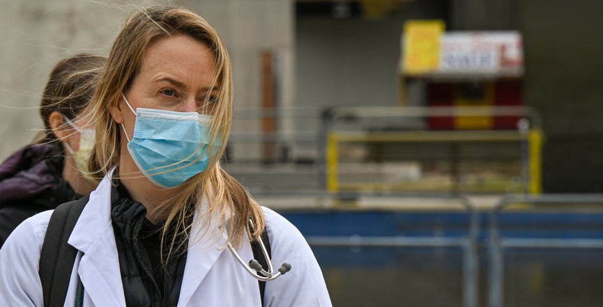 A doctor participating in a protest calling for a faster response to the spread of COVID-19 in the homeless shelter system. Image: michael_swan/Flickr