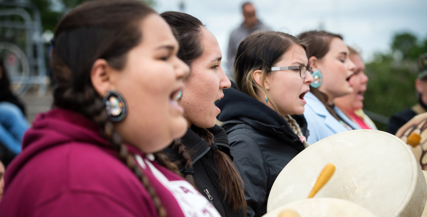 Women drum at the Kitchi KAIROS blanket exercise in Ottawa, June 2, 2017. Image: Extremeline Productions