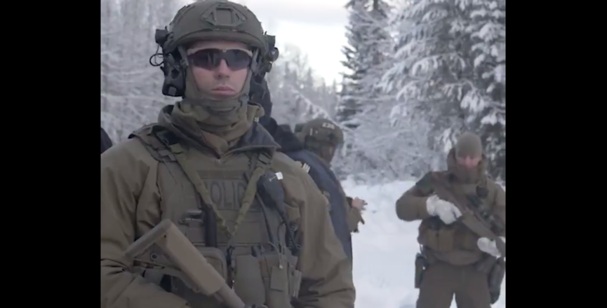 Armed RCMP officer trespasses on unceded Wet'suwet'en territory in October 2019. Image: Unist'ot'en Camp/Video Screenshot/Twitter