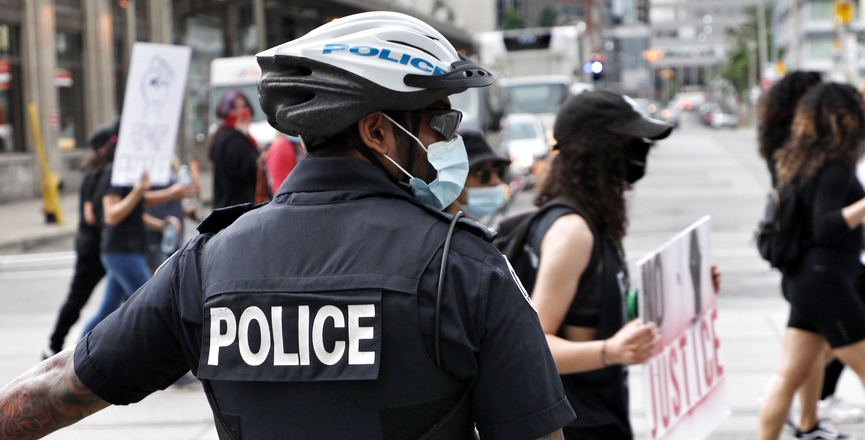 Police officer at a Toronto Black Lives Matter demonstration in June, 2020. Image: Mitchel Raphael