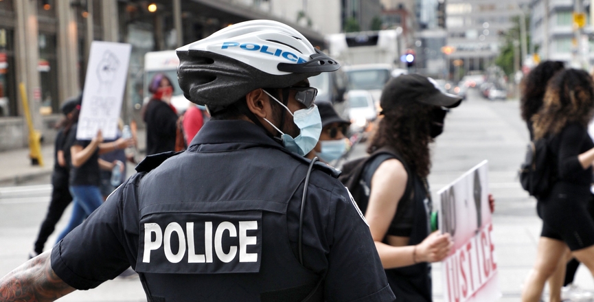 Police officer at a Toronto Black Lives Matter demonstration in June 2020. Image: Mitchel Raphael