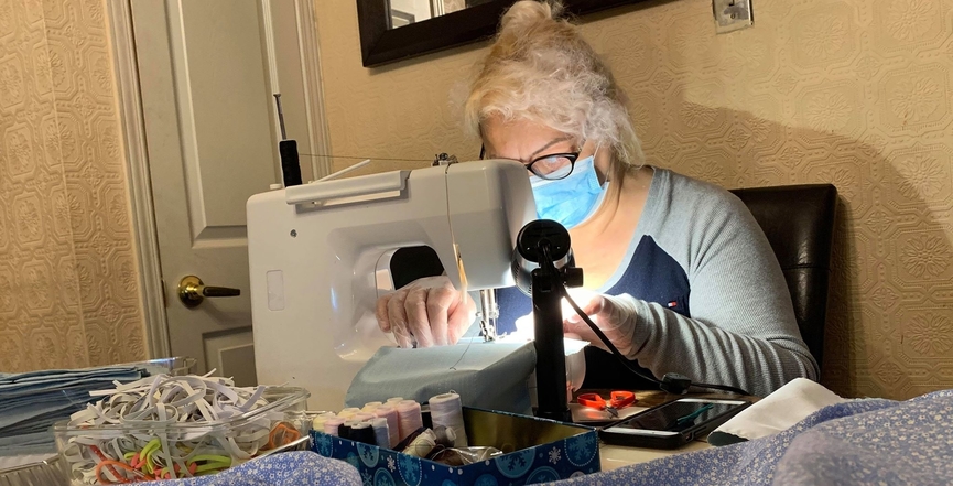 Celina Urbanowicz making masks. Image: Matthew Behrens