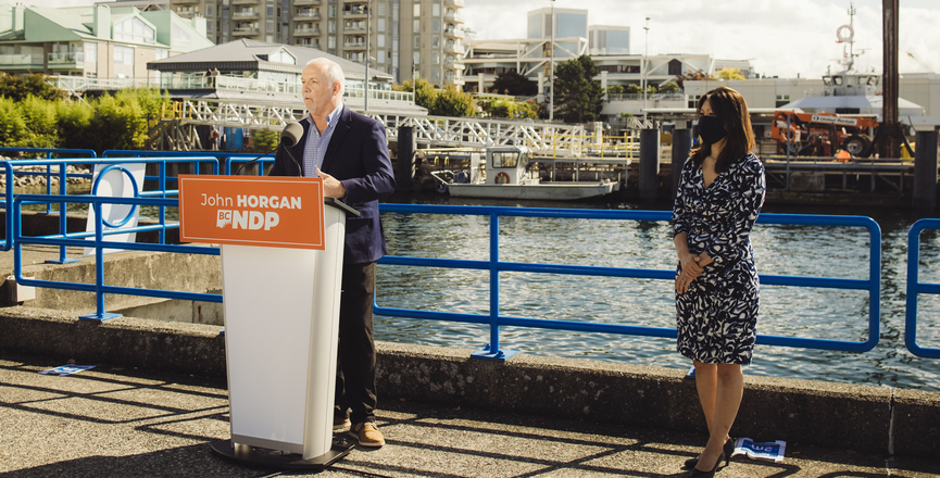 BC NDP Leader John Horgan flanked by candidate Bowinn Ma on campaign trail on September 29, 2020. Image: John Horgan/Twitter