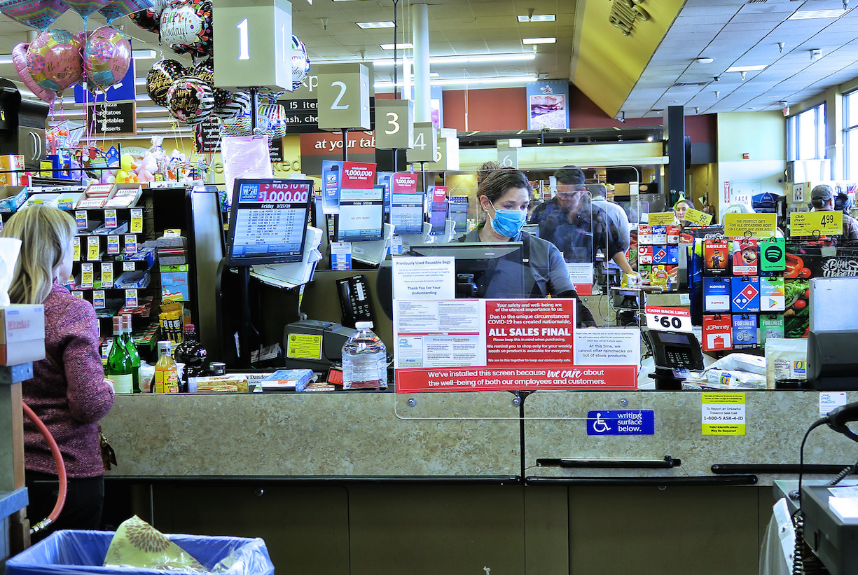 Grocery store cashier. Image credit: Russ Allison Loar/Flickr