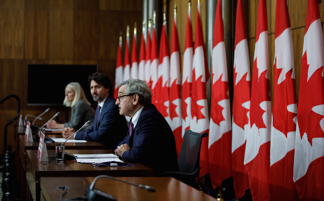 Prime Minister Trudeau, Minister McKenna and Michael Sabia make an announcement on infrastructure funding, October 2020. Image credit: Adam Scotti/PMO