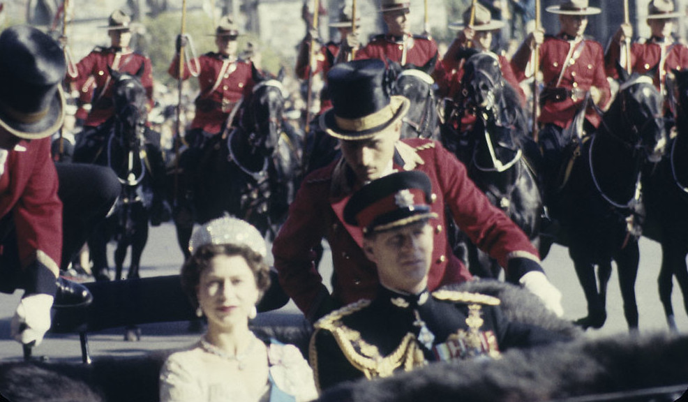 Queen Elizabeth II and Prince Philip, riding in a landau (carriage) during their royal tour, Ottawa, 1957. Image credit: Rosemary Gilliat Eaton/BiblioArchives / LibraryArchives via Flickr