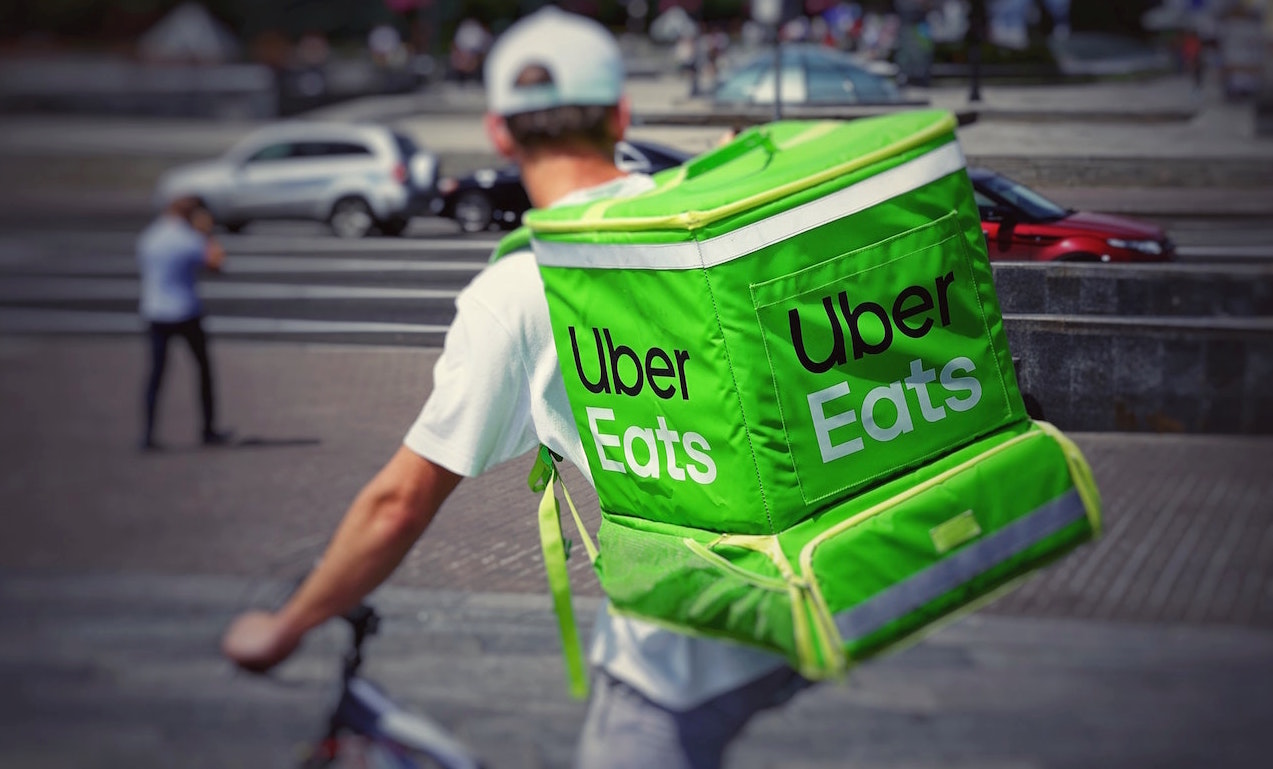 Person with Uber Eats backpack. Image credit: Robert Anasch/Unsplash