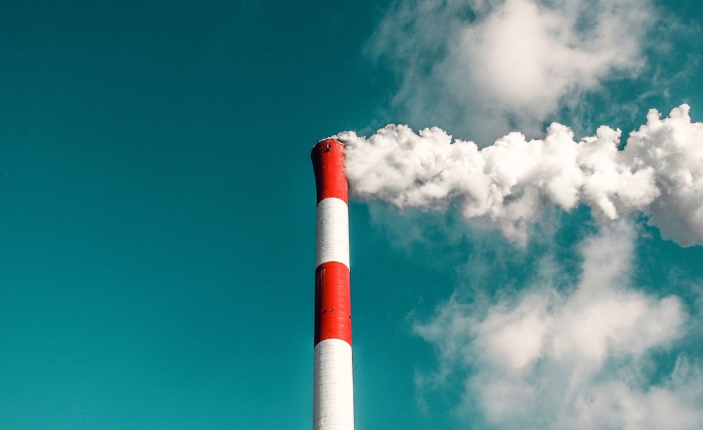 Smoke from a factory chimney. Image credit: veeterzy/Unsplash