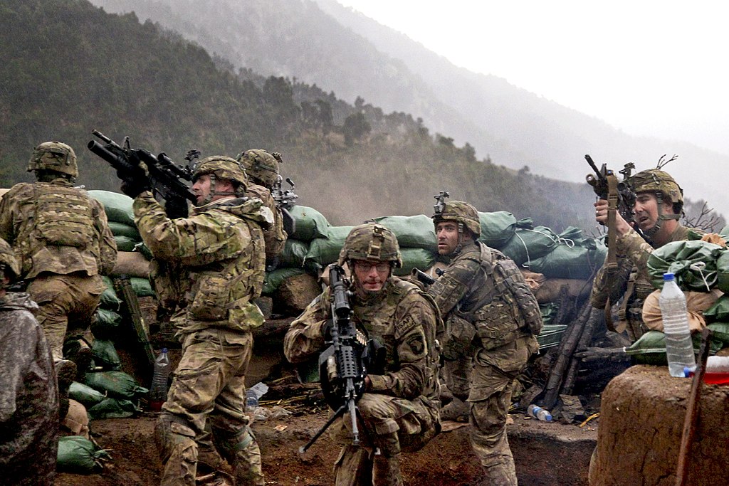 U.S. soldiers in a firefight with Taliban forces in Kunar province, Afghanistan, March 31, 2011. Image credit: Cameron Boyd/ The U.S. Army/Flickr