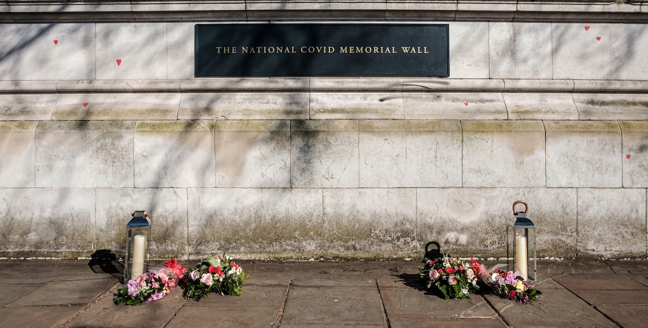 Flowers at the National COVID Memorial Wall in London, U.K. Image credit: Ehimetalor Akhere Unuabona/Unsplash