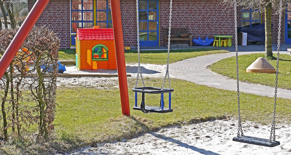 Playground and swing set. Image credit: hpgruesen/Pixabay