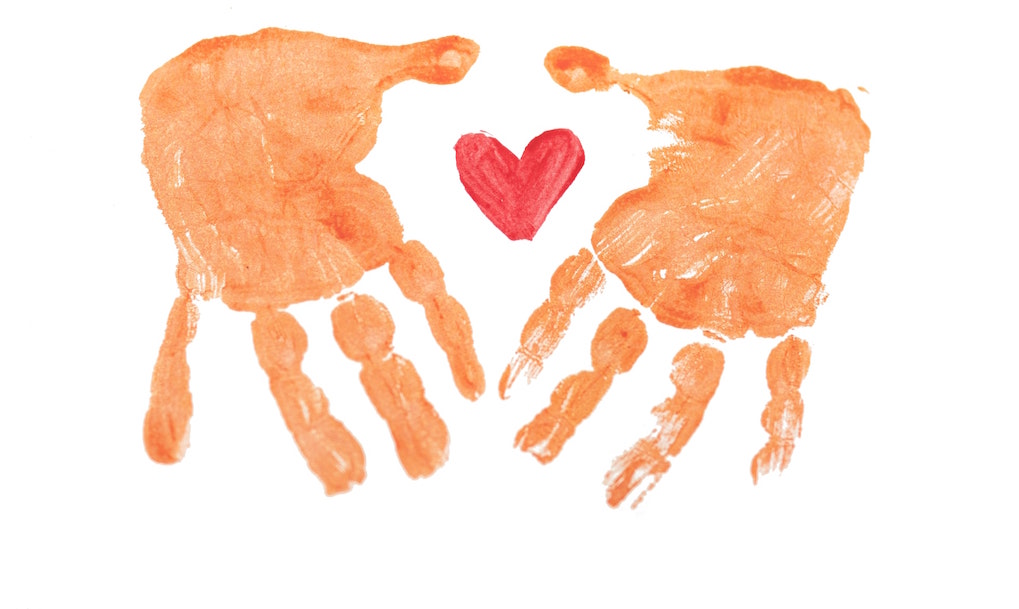 Print of hands with heart. Image credit: Rod Long/Unsplash